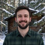 James, a guest, outside the Creek Cabin in winter